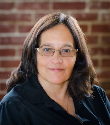 Portrait of Nadine Daubert, Realtor.
